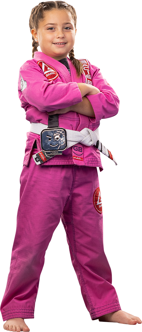 Young girl in pink gi with arms crossed